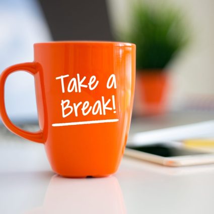 image of an orange mug with take a break written on